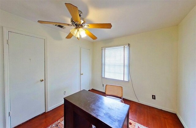 315 Magnolia St, Waycross, GA 31501 - unfurnished office featuring visible vents, baseboards, ceiling fan, and dark wood finished floors