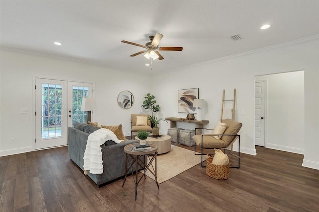 living room featuring ornamental molding, dark hardwood / wood-style floors, ceiling fan, and french doors