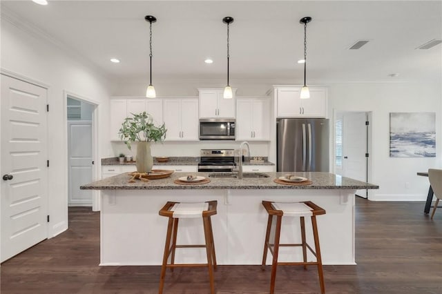 kitchen featuring sink, white cabinets, a kitchen island with sink, stainless steel appliances, and crown molding