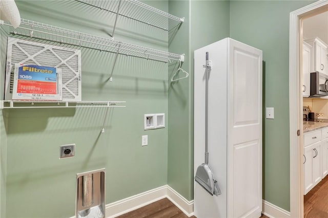 laundry area with hookup for a washing machine, wood-type flooring, and electric dryer hookup