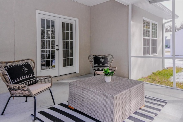 view of patio featuring french doors