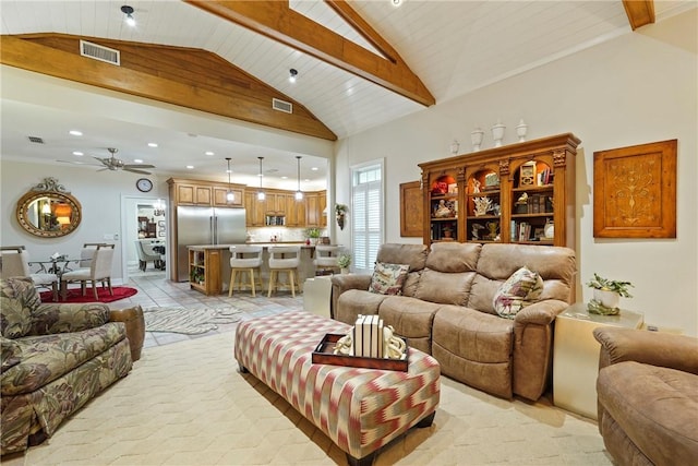 219 Abbott Ln, Saint Simons Island, GA 31522 - kitchen with stainless steel appliances, stone tile floors, recessed lighting, backsplash, and brown cabinets