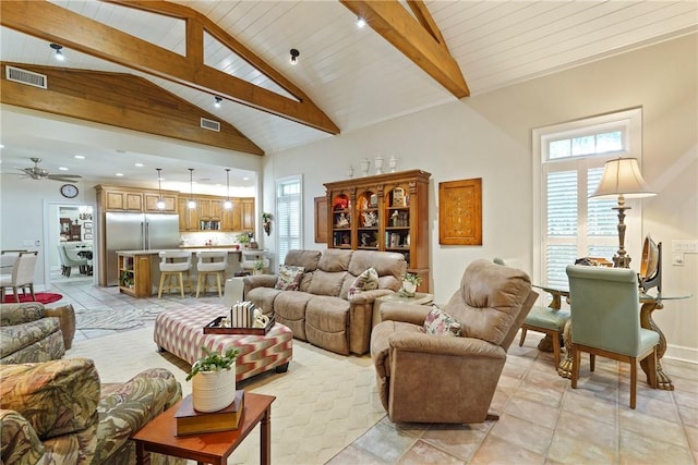 219 Abbott Ln, Saint Simons Island, GA 31522 - living room featuring high vaulted ceiling, a ceiling fan, and a wooden ceiling with exposed beams