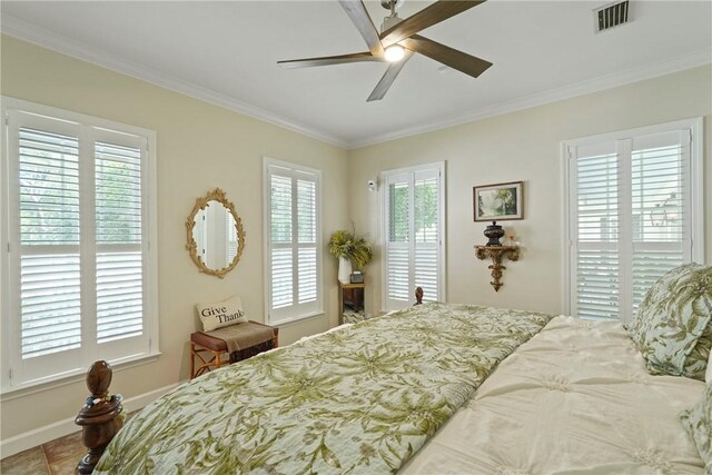 219 Abbott Ln, Saint Simons Island, GA 31522 - bedroom with multiple windows, crown molding, and ceiling fan