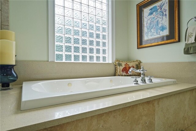 219 Abbott Ln, Saint Simons Island, GA 31522 - full bath with a jetted tub