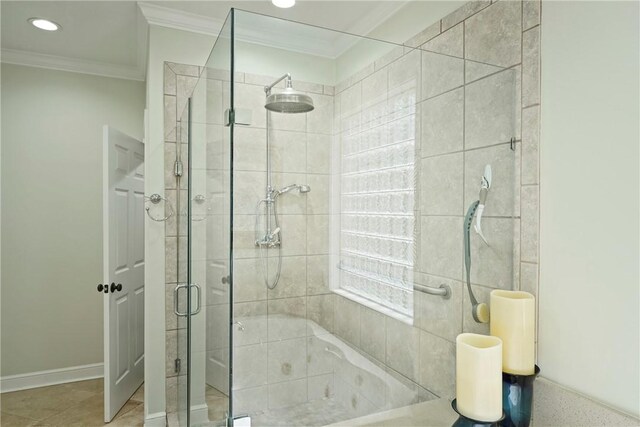 219 Abbott Ln, Saint Simons Island, GA 31522 - full bath featuring a stall shower, crown molding, and recessed lighting