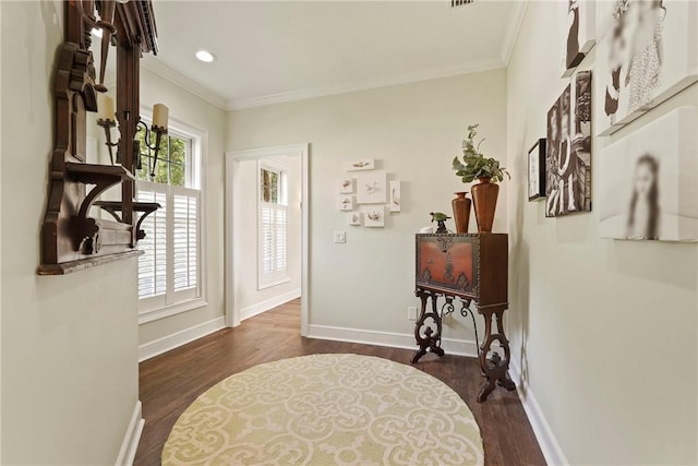 219 Abbott Ln, Saint Simons Island, GA 31522 - foyer with dark wood-type flooring, ornamental molding, and recessed lighting