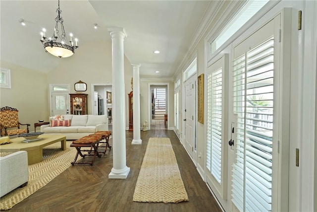 219 Abbott Ln, Saint Simons Island, GA 31522 - entrance foyer with decorative columns, recessed lighting, vaulted ceiling, and crown molding