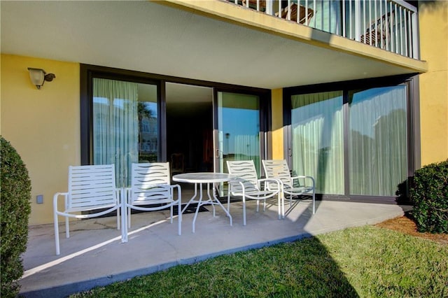 view of patio / terrace with a balcony