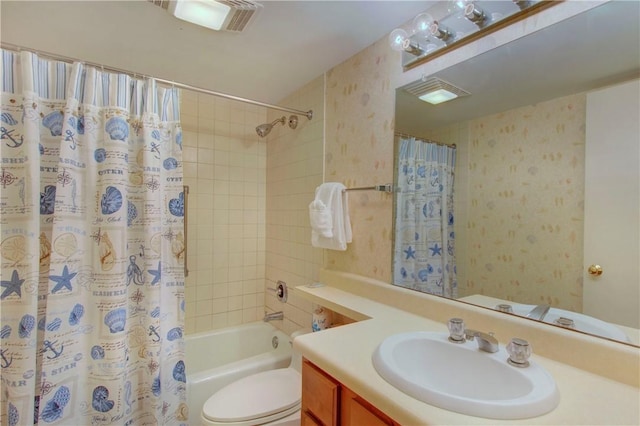 full bathroom featuring vanity, toilet, and shower / bathtub combination with curtain