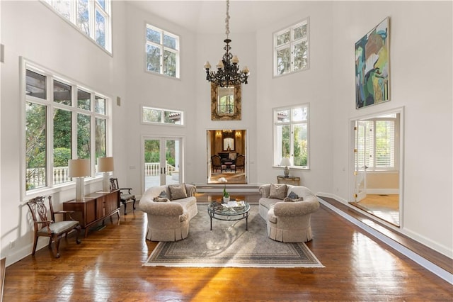 interior space featuring a wealth of natural light and a chandelier