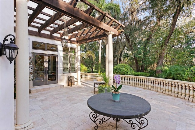 view of patio / terrace featuring a pergola and french doors