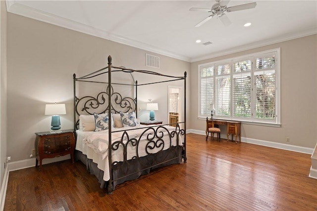 bedroom featuring ceiling fan, wood-type flooring, and crown molding