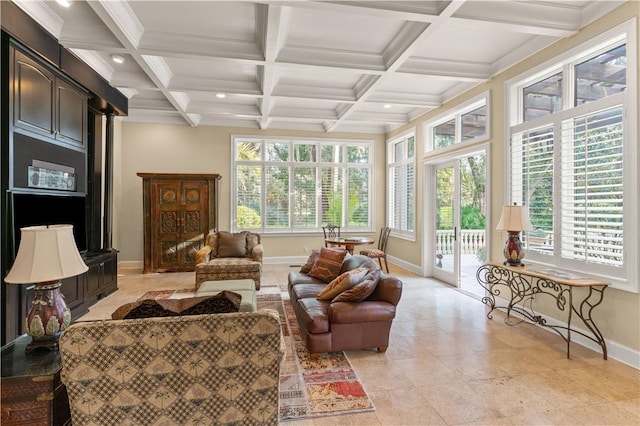 sunroom with beamed ceiling, a healthy amount of sunlight, and coffered ceiling