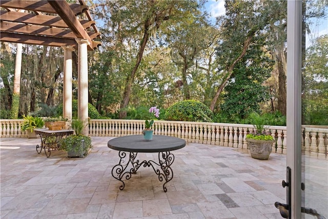 view of patio featuring a pergola