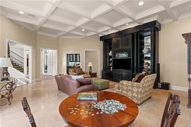 living room with beamed ceiling, a towering ceiling, and coffered ceiling