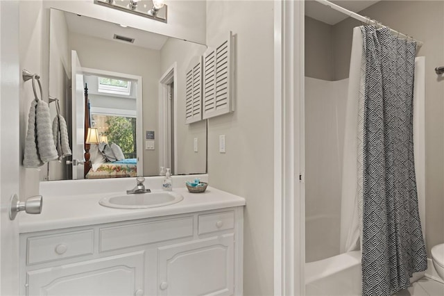 669 N Golf Villas, Saint Simons Island, GA 31522 - full bathroom featuring vanity, shower / bath combination with curtain, and connected bathroom