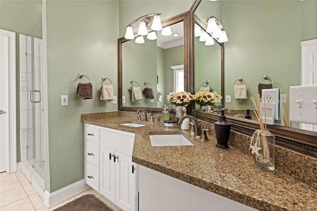 106 Hickory Pne, Brunswick, GA 31523 - full bathroom with a shower stall, tile patterned floors, double vanity, and baseboards