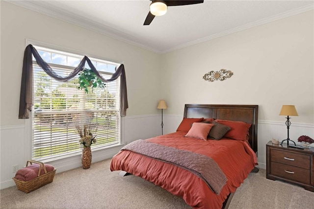 106 Hickory Pne, Brunswick, GA 31523 - carpeted bedroom featuring wainscoting, multiple windows, crown molding, and a ceiling fan