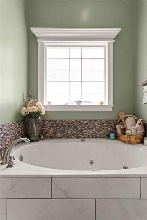 106 Hickory Pne, Brunswick, GA 31523 - bathroom featuring healthy amount of natural light and a jetted tub