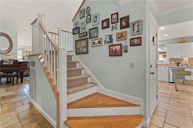 403 Indigo, Saint Simons Island, GA 31522 - stairway featuring stone tile flooring, recessed lighting, baseboards, and ornamental molding