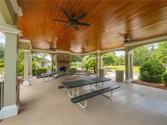 206 Placid Rd, Saint Marys, GA 31558 - view of patio / terrace with an outdoor brick fireplace and ceiling fan
