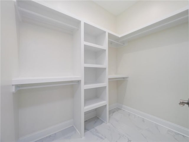 206 Placid Rd, Saint Marys, GA 31558 - walk in closet featuring marble look tile flooring