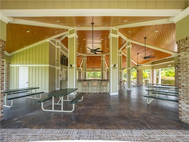 206 Placid Rd, Saint Marys, GA 31558 - view of community featuring ceiling fan, high vaulted ceiling, a bar, wood ceiling, and recessed lighting
