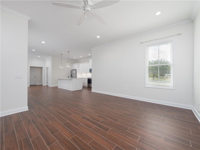 206 Placid Rd, Saint Marys, GA 31558 - unfurnished living room with dark wood-style floors, ceiling fan, recessed lighting, and crown molding