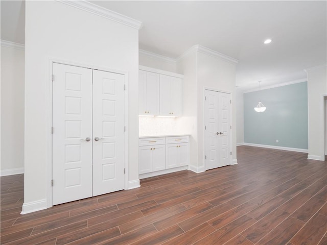206 Placid Rd, Saint Marys, GA 31558 - unfurnished room featuring dark wood-style floors, crown molding, and recessed lighting