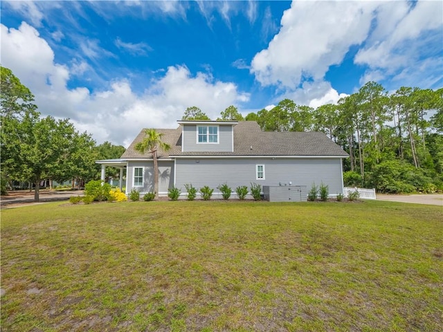 206 Placid Rd, Saint Marys, GA 31558 - rear view of property featuring a lawn