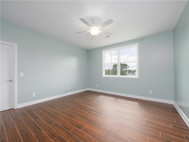 206 Placid Rd, Saint Marys, GA 31558 - unfurnished room with a ceiling fan and dark wood-style floors