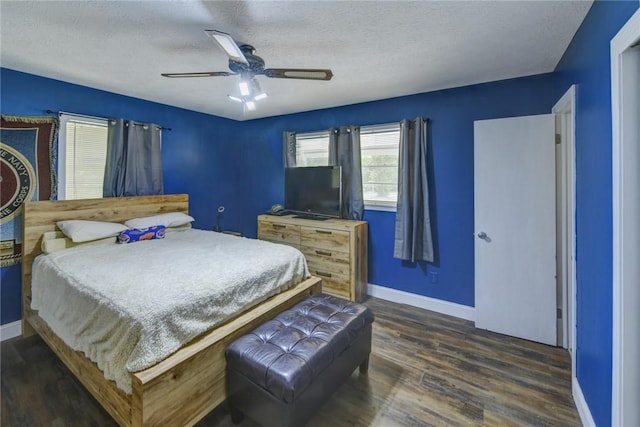 706 Jenkins St, Blackshear, GA 31516 - bedroom featuring wood finished floors, a textured ceiling, and ceiling fan