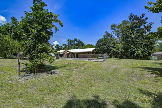 706 Jenkins St, Blackshear, GA 31516 - view of grassy yard with a patio
