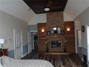 105 Lonnie Johnson Rd, Hazlehurst, GA 31539 - bedroom with a fireplace, wood finished floors, and high vaulted ceiling
