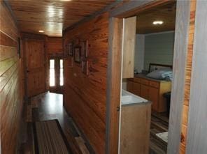 105 Lonnie Johnson Rd, Hazlehurst, GA 31539 - hall with wooden walls and wooden ceiling