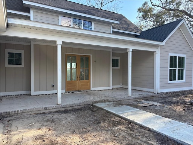 entrance to property featuring french doors