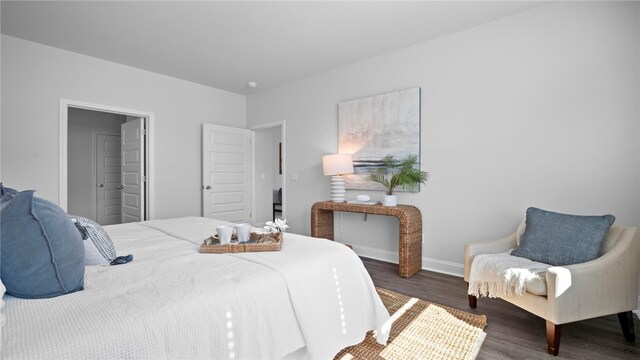 1037 Lakes Blvd, Brunswick, GA 31525 - bedroom with wood finished floors and baseboards