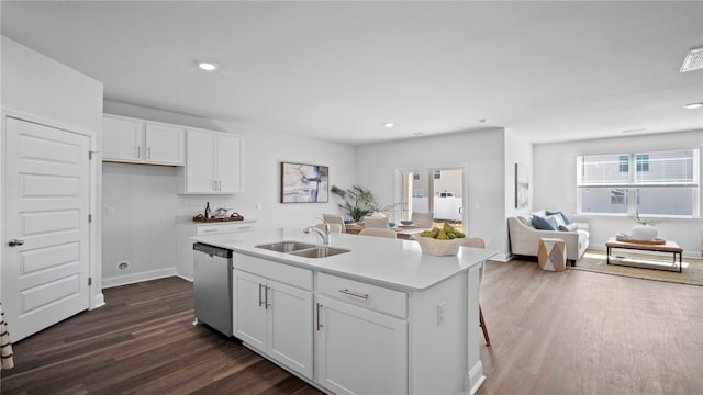 1037 Lakes Blvd, Brunswick, GA 31525 - kitchen with dishwasher, open floor plan, dark wood-type flooring, white cabinets, and light countertops