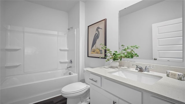 1037 Lakes Blvd, Brunswick, GA 31525 - full bathroom featuring vanity, shower / bathtub combination, and wood finished floors