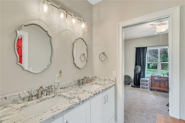 bathroom featuring vanity and ceiling fan