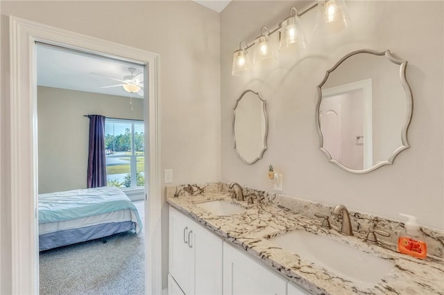 bathroom with vanity and ceiling fan