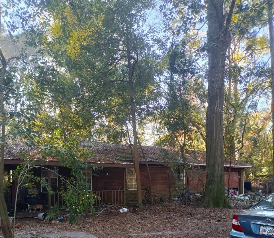 774 E Plum St, Jesup, GA 31546 - rear view of house with a porch