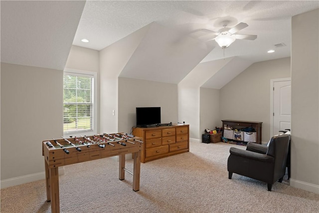 game room with carpet, vaulted ceiling, and ceiling fan