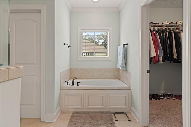 bathroom with a bathing tub and ornamental molding