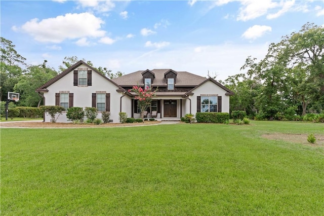 view of front of home with a front lawn