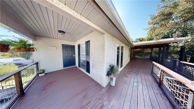 deck with a sunroom