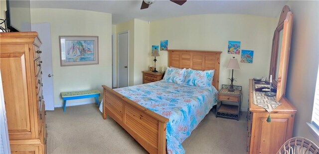 850 Mallery St Unit 4S, Saint Simons Island, GA 31522 - bedroom with light carpet, baseboards, and ceiling fan