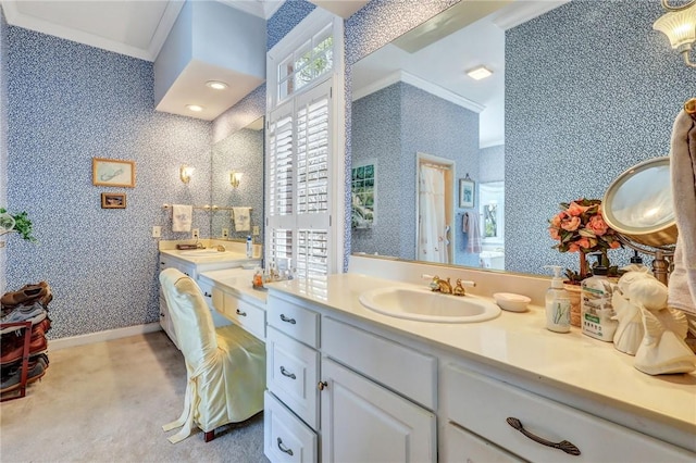 bathroom featuring baseboards, ornamental molding, vanity, and wallpapered walls