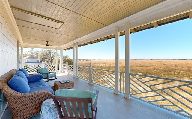 view of patio / terrace featuring outdoor lounge area and a rural view